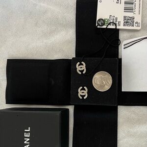 Authentic Chanel NWT CC logo studs champagne gold metal with mini pearls.